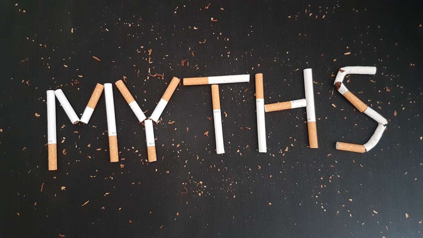 The word myths spelled out with cigarettes